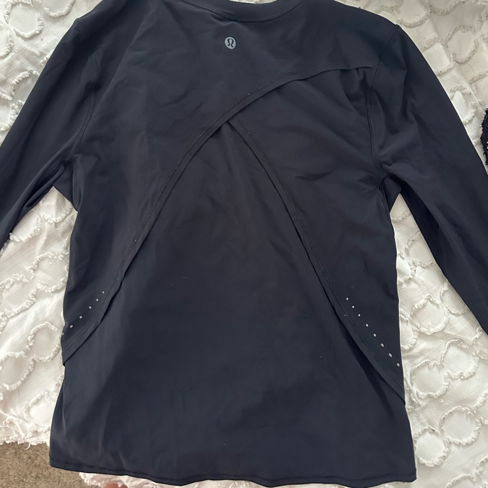 Lululemon size 4 long sleeve “Rulu” running shirt